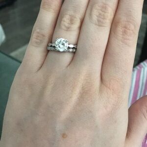 7mm (1.5 Ct equivalent) moissanite ring with scalloped edges in SS size 6.